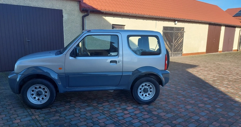 Suzuki Jimny cena 35700 przebieg: 155460, rok produkcji 2011 z Nidzica małe 211